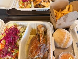 Turkish platter with rotisserie chicken and rice served at The Turkish Rotisserie in Calgary